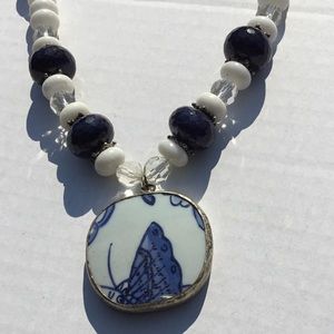 Blue beaded butterfly pendant necklace